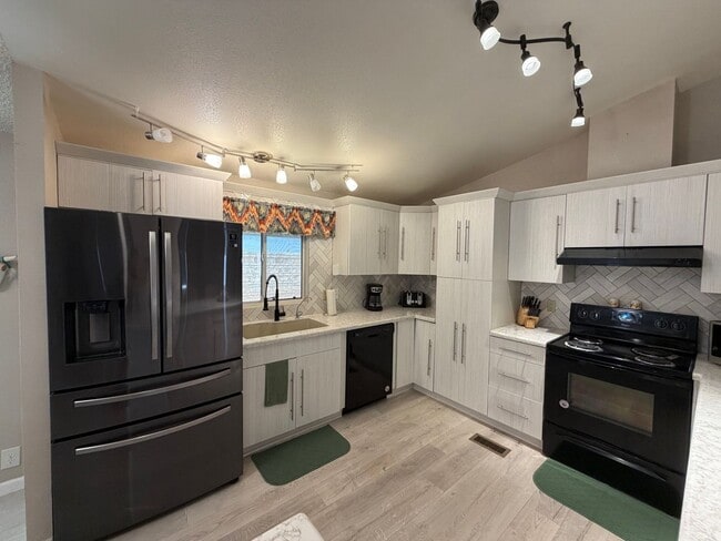 Building Photo - 13239 E 49th Dr