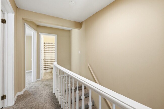 Building Photo - This well-maintained 4-bedroom, 2-bath duplex offers a spacious layout with all the comforts of h...