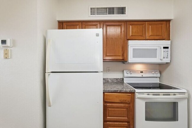Building Photo - Bright 3-Bed Tucson Rental Home with Expansive Fenced Backyard Near U of A