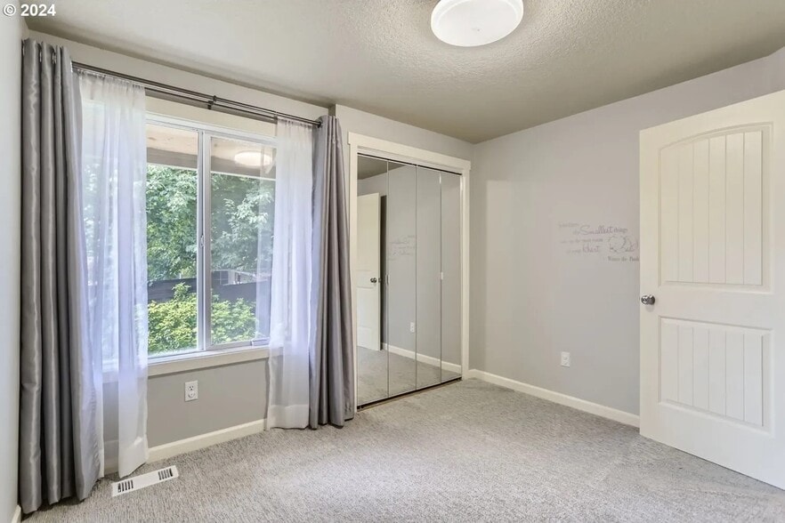 Building Photo - 9019 SW Picasso Pl