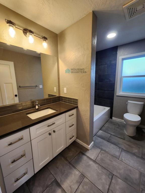 Building Photo - 1108 E 37th Ave