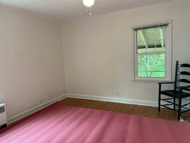 Large bedroom hardwood floors - 710 S Maple St