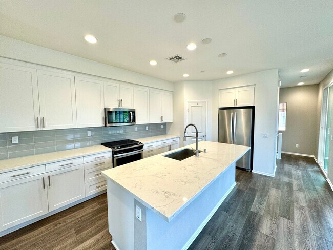 Building Photo - Spacious 4BD/3.5BA Townhome in Oceanside with Community Pool, 2-Car Garage & Covered Balcony
