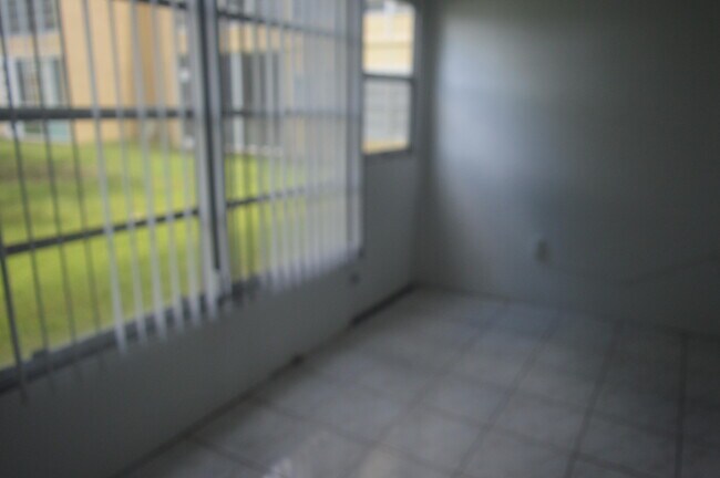 Building Photo - 6091 NW 61st Ave