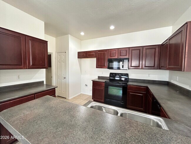 Building Photo - 17218 W Country Gables Dr