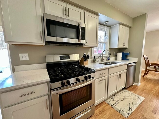 Building Photo - W224N7690 Wooded Hills Dr