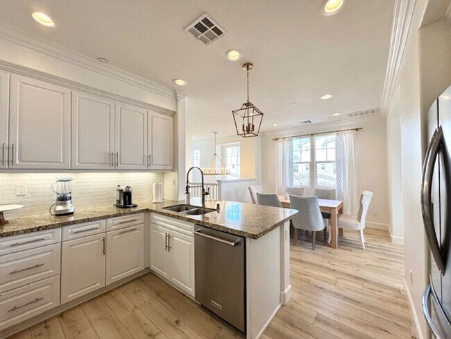 Building Photo - 4 Bedroom + 3.5 Bathroom Townhome | The Westerlies | Unfurnished