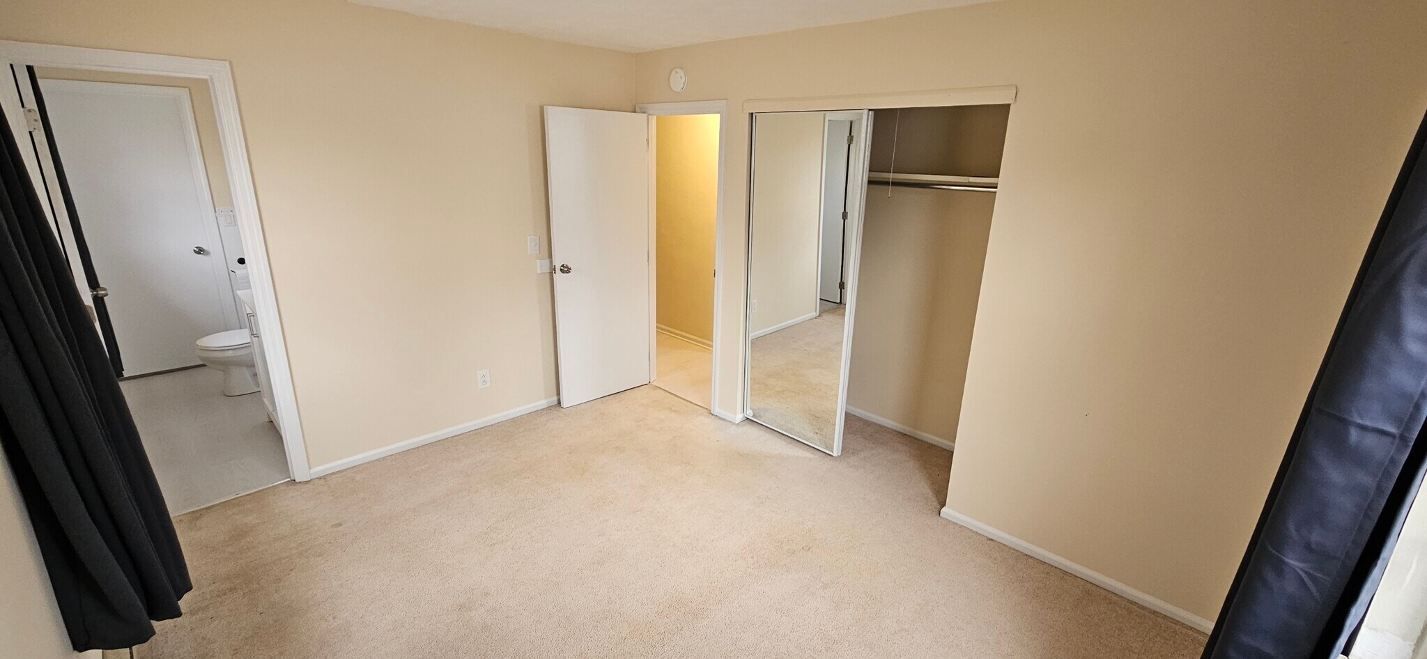 Back/Master Bedroom with view of Half Bathroom on the left. Please note that rooms are larger than t - 578 Tyler St