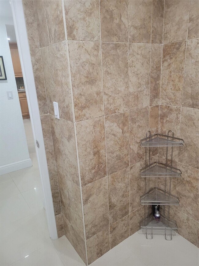 Building Photo - 19370 Collins Ave