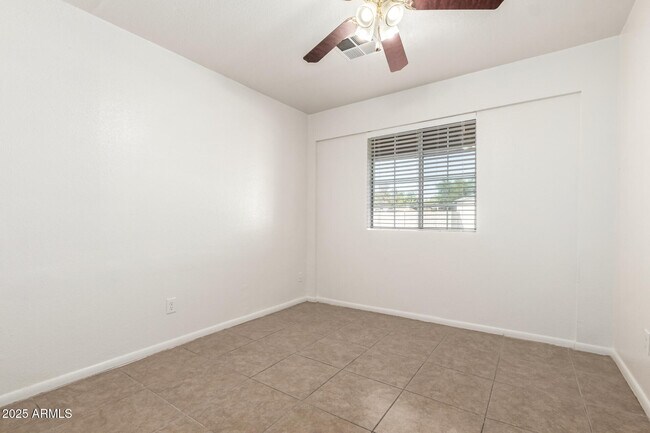 Building Photo - 8107 W College Dr