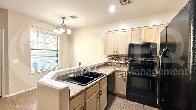 Building Photo - 6710 E University Dr