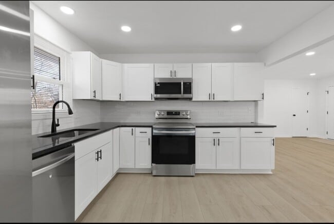 Building Photo - For Rent – Beautifully Renovated 4 Bedroom, 2 Bath Home