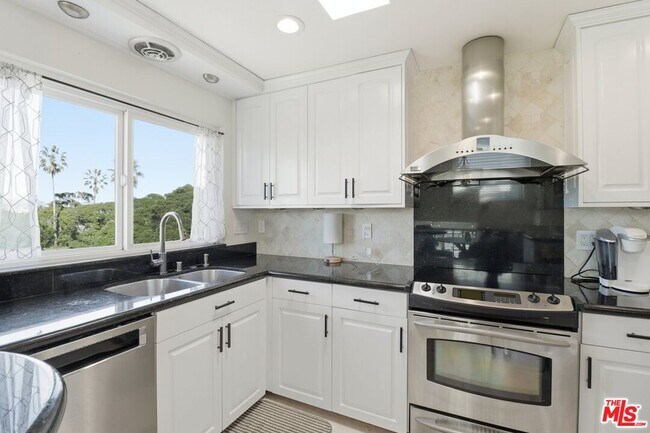 Building Photo - 6400 Pacific Ave