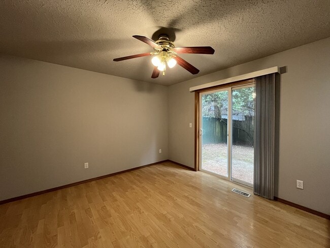 Building Photo - 3-Bed Home with Fireplace, Fenced Backyard, 2 Car Garage & Front Patio!