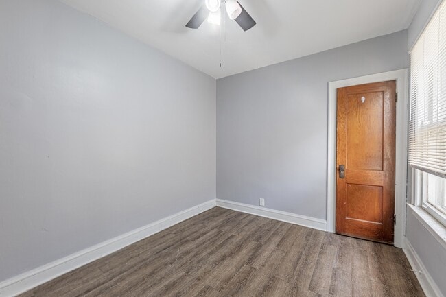 Building Photo - 6141 S Kilbourn Ave