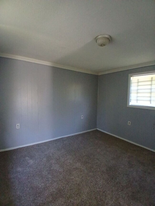 Building Photo - Ideally located 2-bedroom, 1.5-bathroom home nestled in a highly sought-after neighborhood - $99 ...