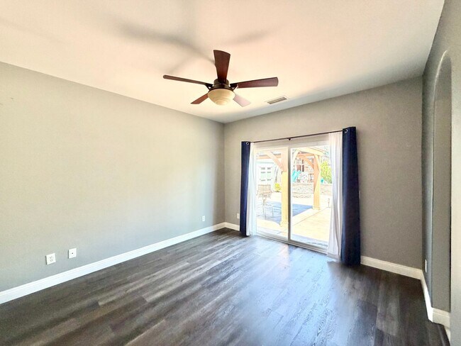 Building Photo - Beautifully Renovated 4 Bedroom Home with INCLUDED Solar, Large Backyard & Gazebo