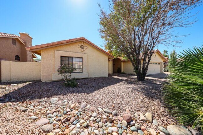 Building Photo - Welcome to this stunning 4-bedroom, 2-bath...