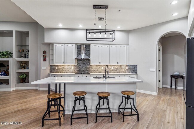 Building Photo - 10695 E Caribbean Ln