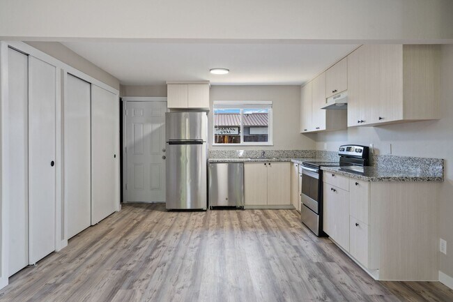 Building Photo - 2BR with dishwasher, on site laundry!