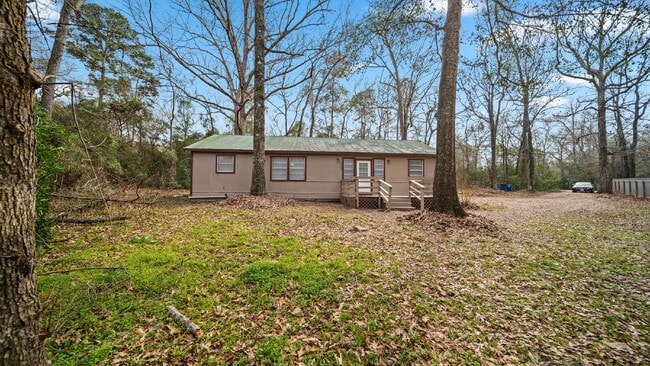 Building Photo - Rural, wooded living in this 4 bedroom, 2 full bath home on just under a quarter of an acre. NEW ...