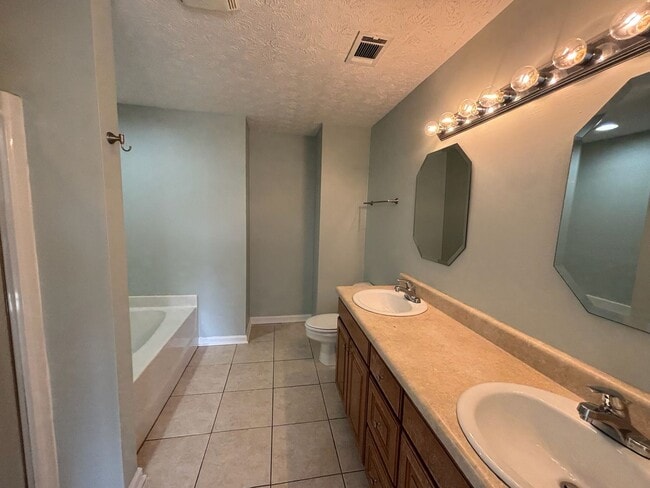 Building Photo - Keys to Happiness – Unlock Your New Home.