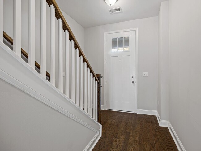 Building Photo - **MOVE IN SPECIAL! 50% off first month's rent!!** Spacious 4BR Townhouse with 2-Car Garage Near D...