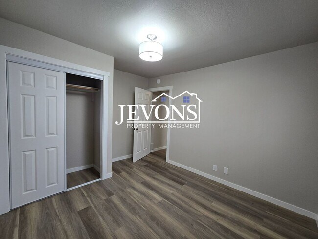 Building Photo - 3 bedroom home with washer and dryer – 1-acre lot next to an orchard – Large and small pets allowed!