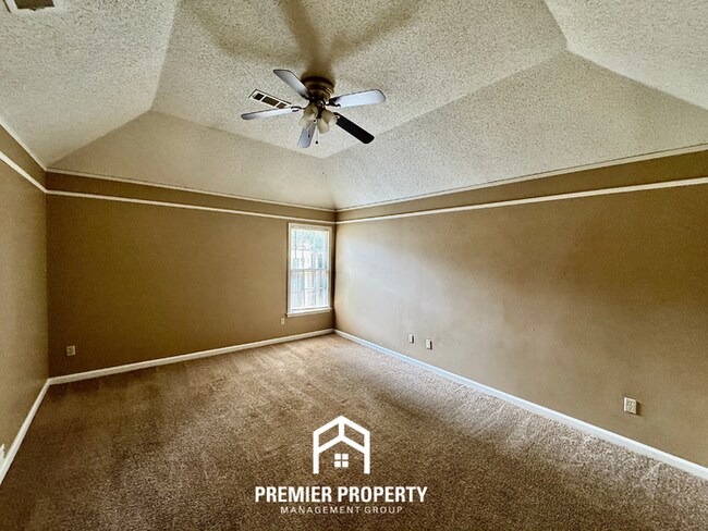 Building Photo - Spacious 3BR/2BA Near Southwind | 1,958 Sq Ft, Brick Fireplace, 2-Car Garage & Quiet Cove