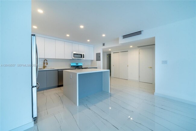 Building Photo - 19380 Collins Ave