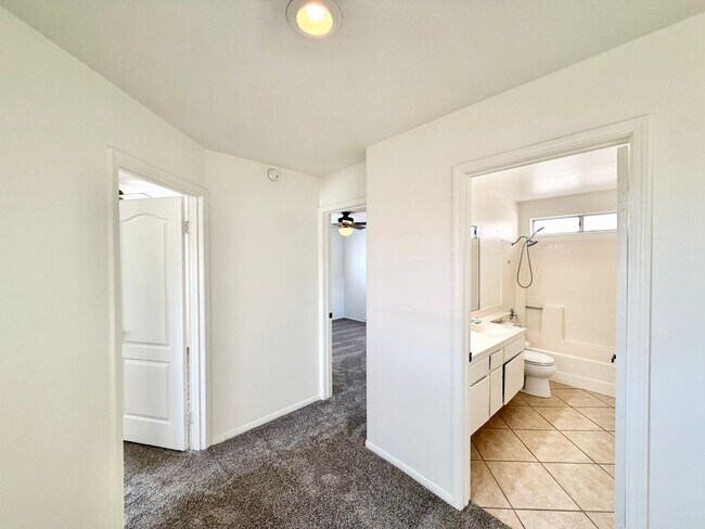 Building Photo - Spacious 5 Bedroom 3 Bathroom Home with Updated Paint, New Roof & Private Balcony
