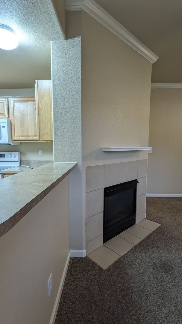 Building Photo - TWO BEDROOM/TWO BATHROOM CONDO WITH AMENITIES IN GATED COMMUNITY!