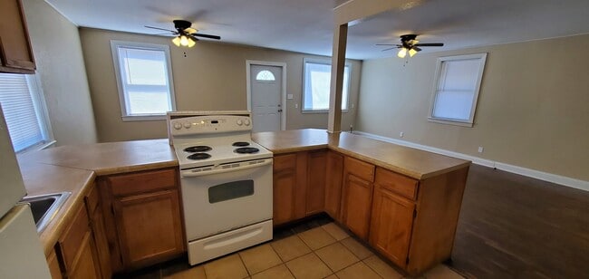 Building Photo - 3 Bedroom with open living room/kitchen/dining area, all on one floor including laundry!