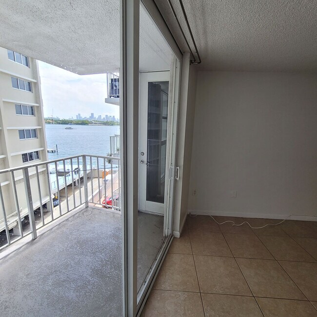 Bedroom and balcony - 1228 West Ave