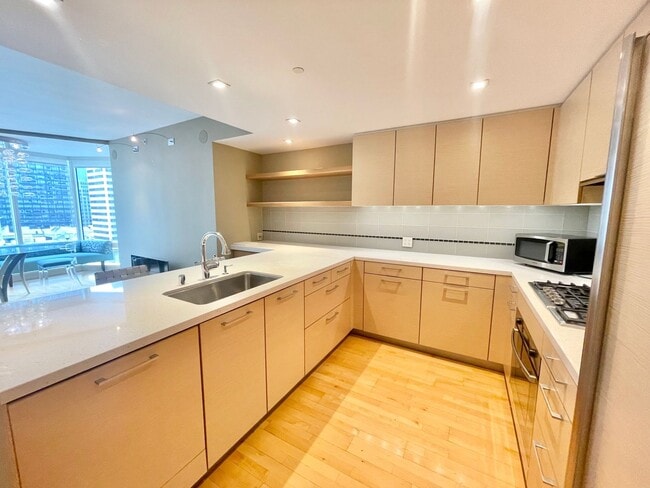 Building Photo - Millennium Stunner! 2BR/2BA 1,245sqft! Pet...