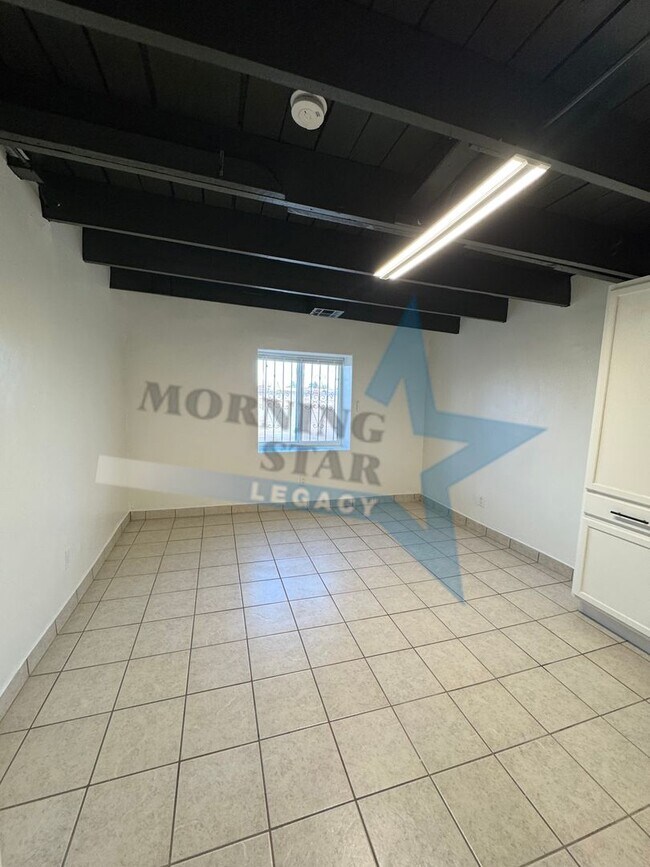 Building Photo - Charming Updated Home w/ Enclosed Yard & Storage