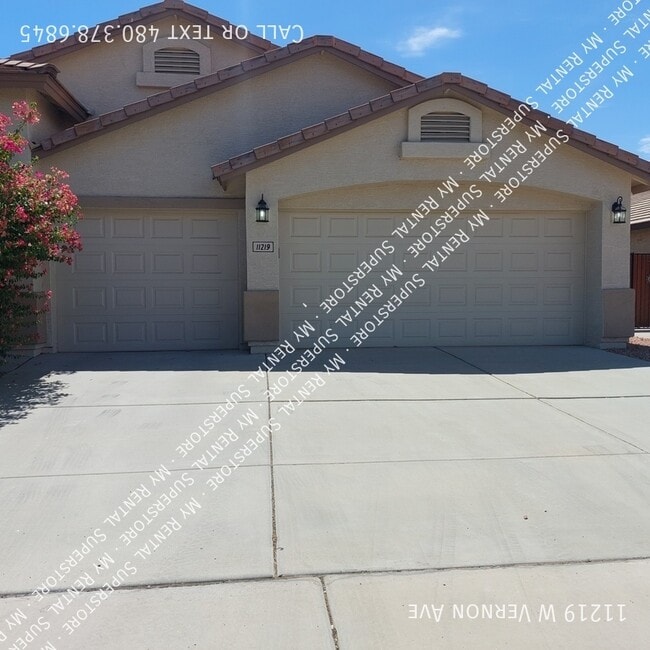 Building Photo - 11219 W Vernon Ave