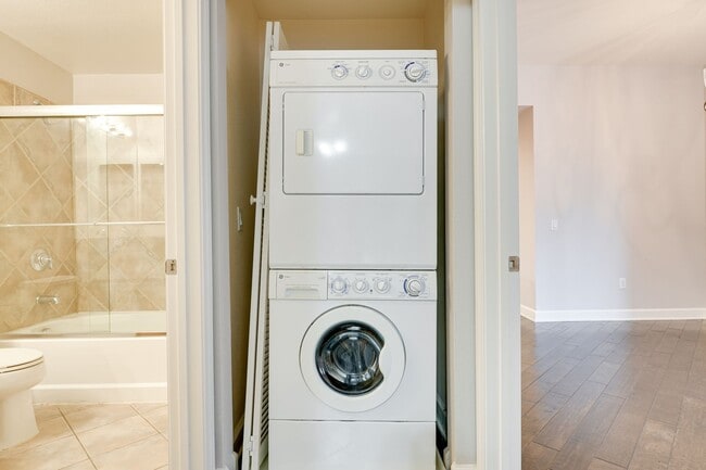 Building Photo - Luxury Guard-Gated 2-Bedroom Condo with Private Garage & Resort Amenities!