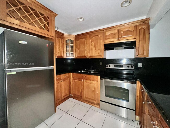 Building Photo - 6095 W 19th Ave