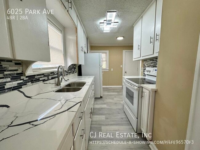 Building Photo - 6025 Park Ave