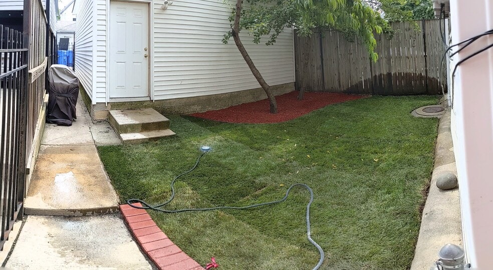 Remodeled back yard with fresh sod - 2455 W Cortland St