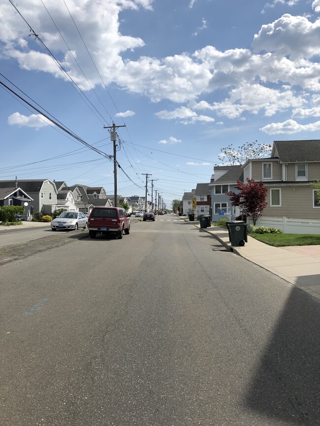 View from street (dead-end) with free street parking. Parking spots included in rental - 840 E Broadway