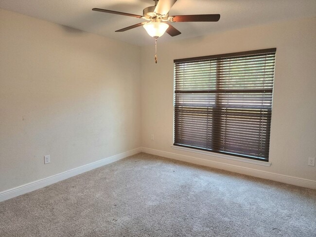 Building Photo - Welcome to this stunning 4-bedroom, 3-bath...