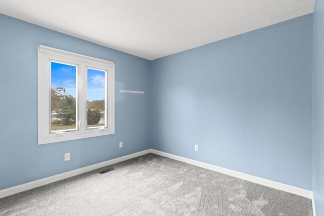 Building Photo - AVAILABLE NOW! Waterfront Living in Carmel! Paddle boat included!