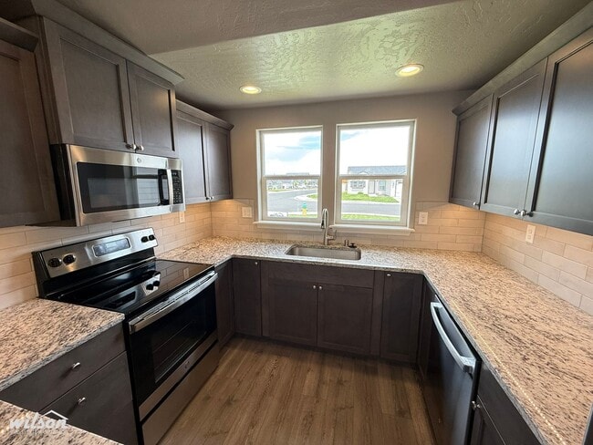 Building Photo - 3bd/2ba House in West Valley with Central AC, Fully Fenced Yard and Two Car Garage!