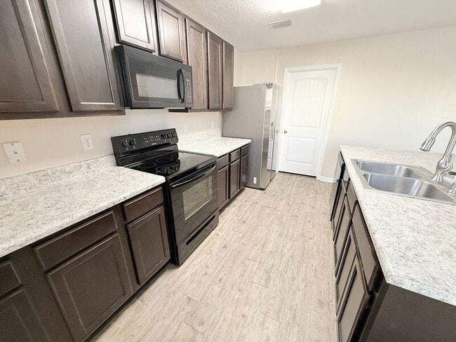 Building Photo - 5890 Bay Tree Court