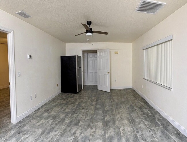 Building Photo - Studio / 1-Bedroom Apartment for Rent – Davenport, FL