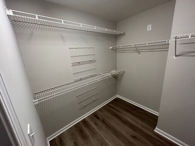 Building Photo - **Spacious 4-Bedroom Home with Walk-In Clo...
