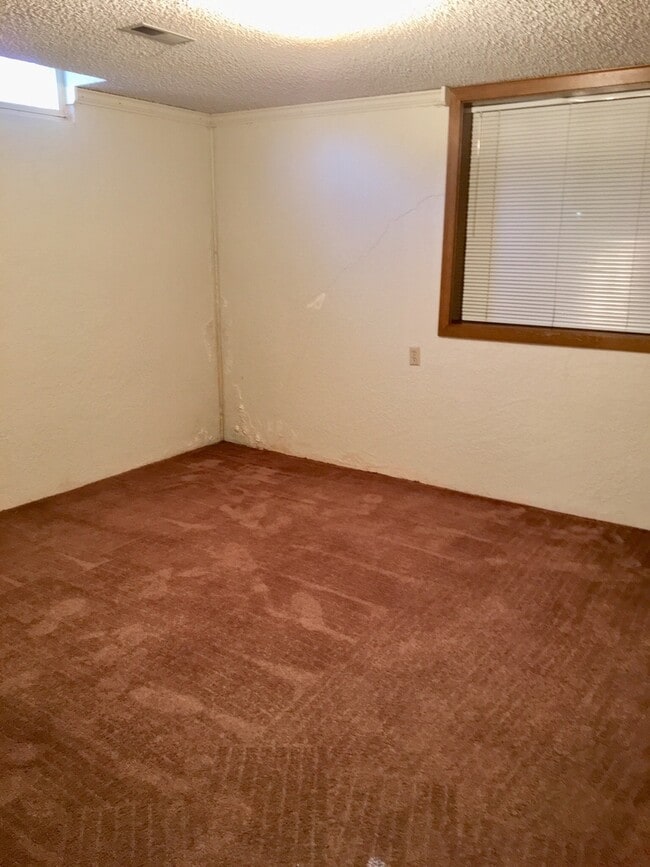 Building Photo - 7511 E 24th Ct N