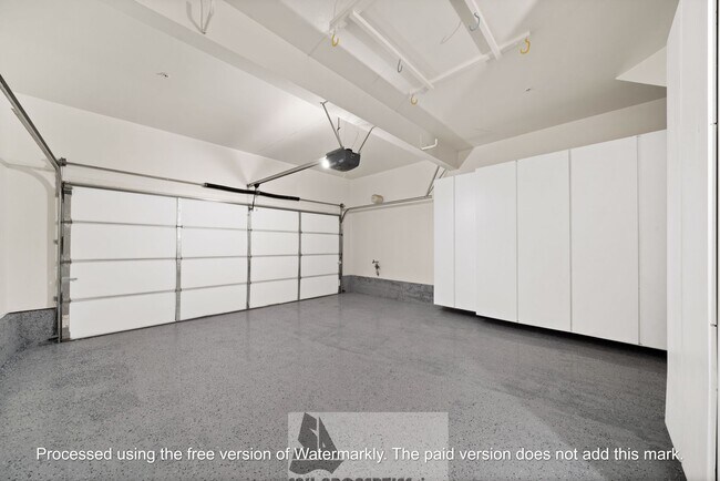 Building Photo - Welcome to this stunning 2-bedroom condo in gated community